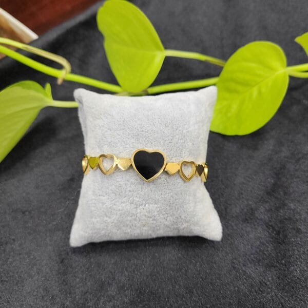 Black heart design gold bracelet open type with glossy black heart centre for women – 26BR0004