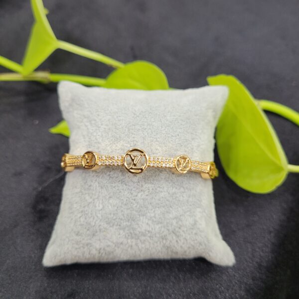 Designer gold bracelet with white stones lock type for women – 26BR0013