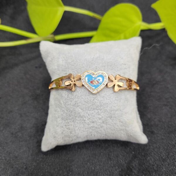 Rose gold heart shaped bracelet open type design with blue heart centre and stones for women – 26BR0002
